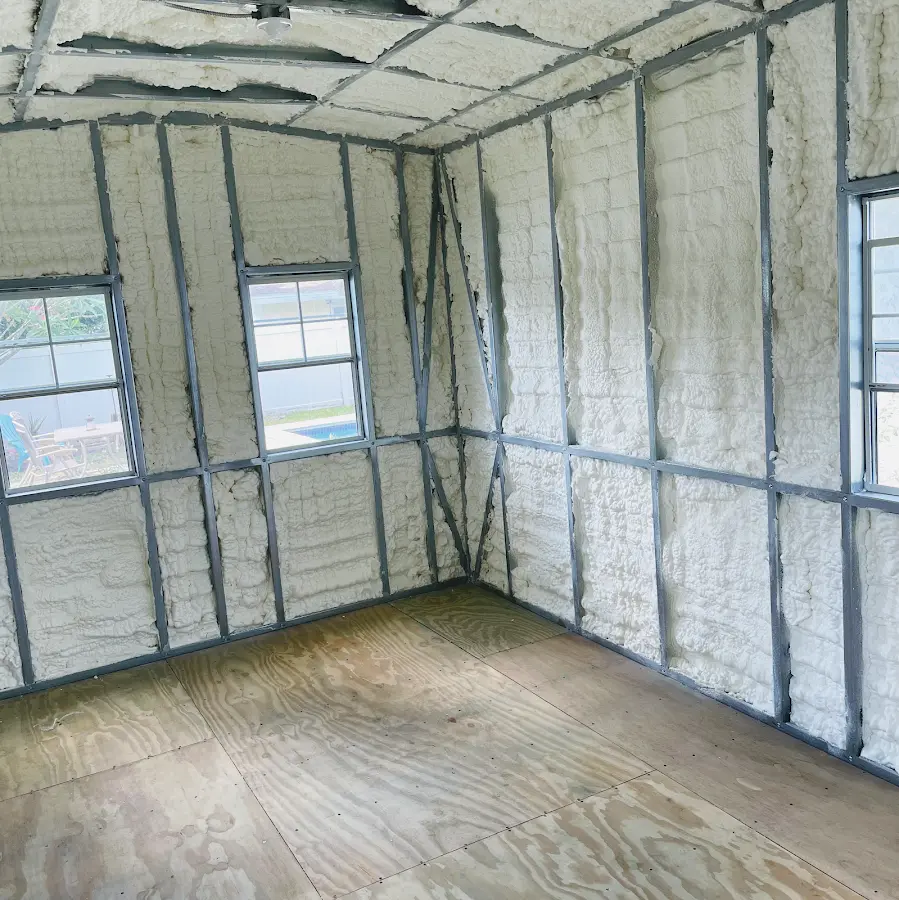 Closed-cell spray foam insulation applied to wall cavities in a residential project in Fishersville